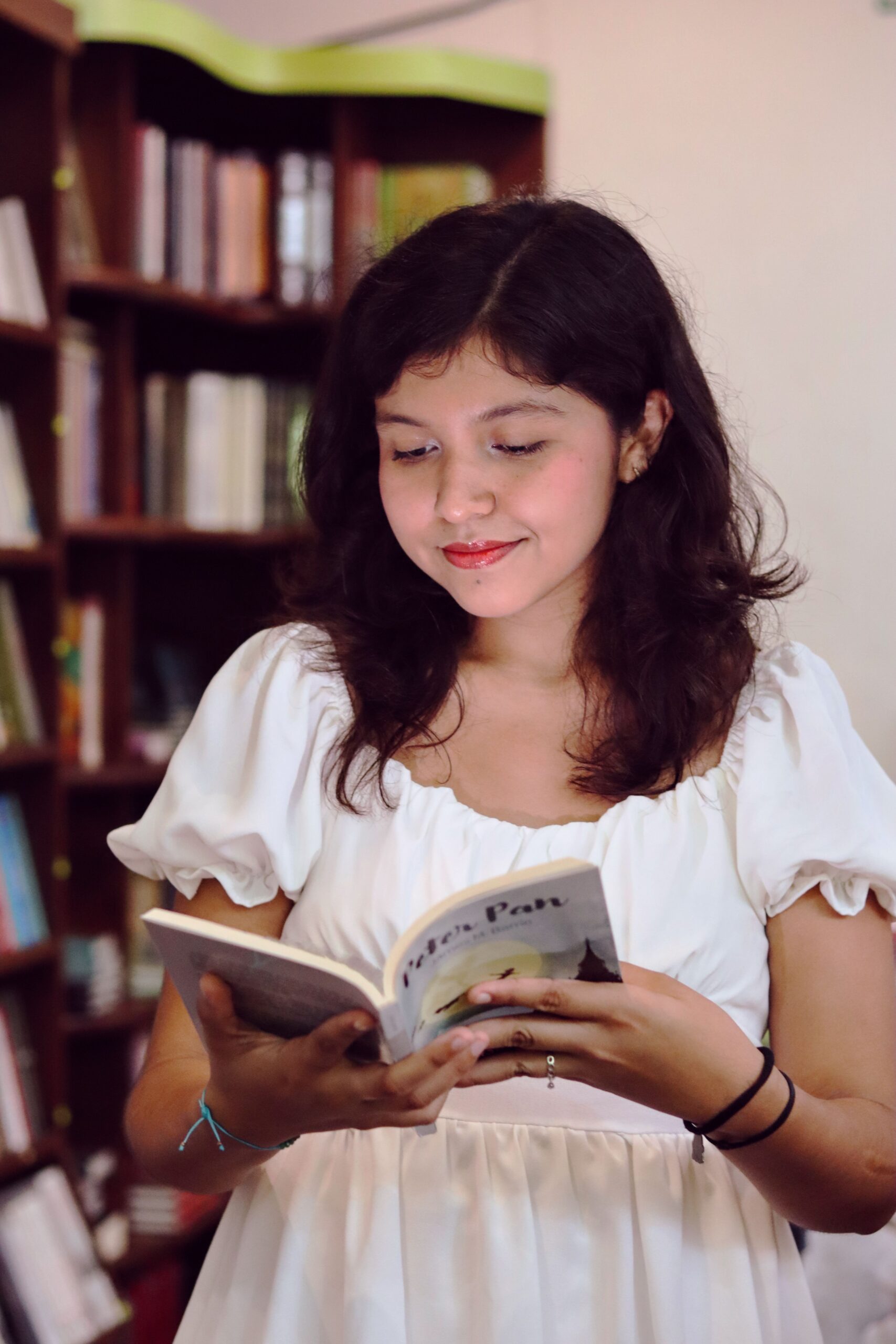First-time author holding published books
